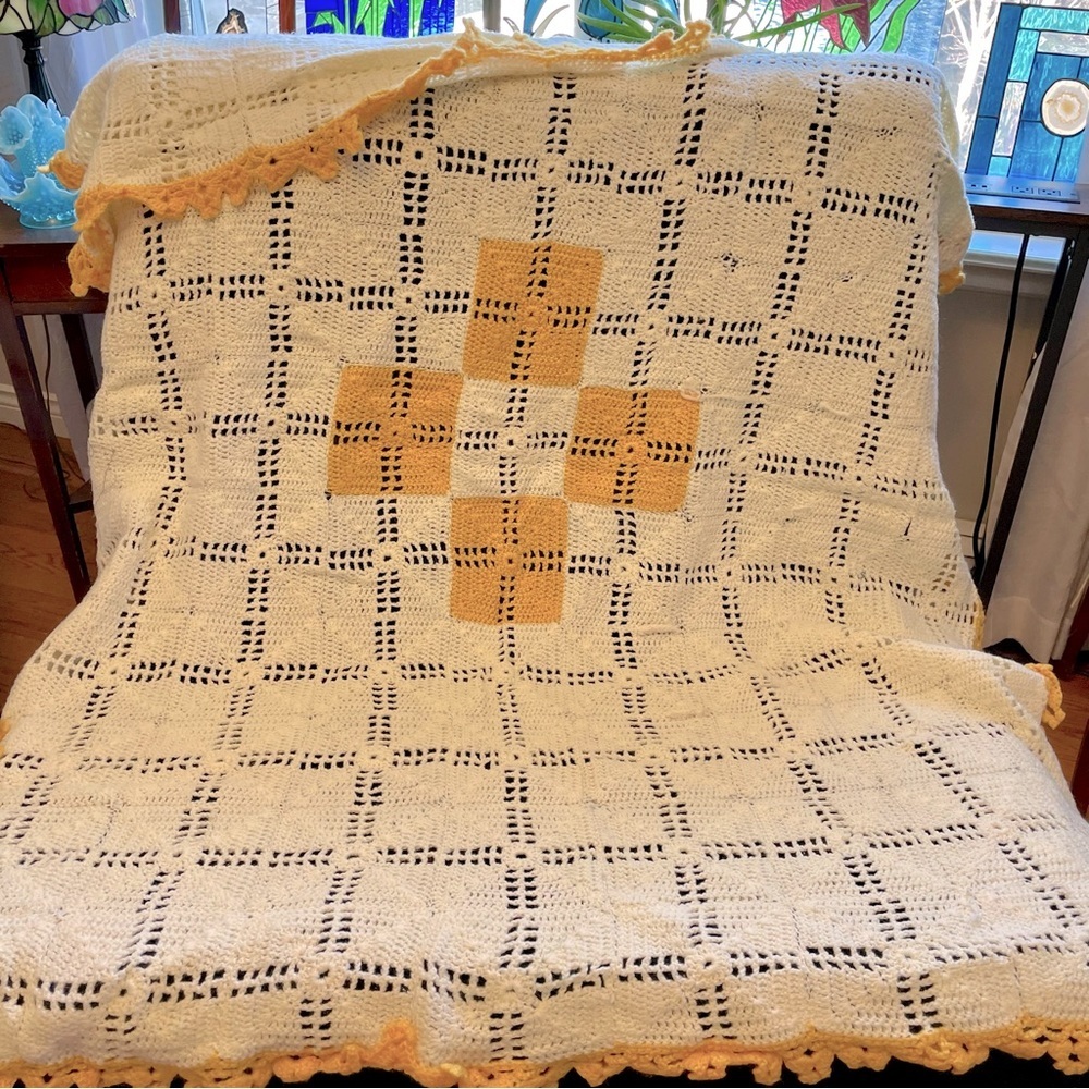 Handmade yellow and white crochet knit blanket
